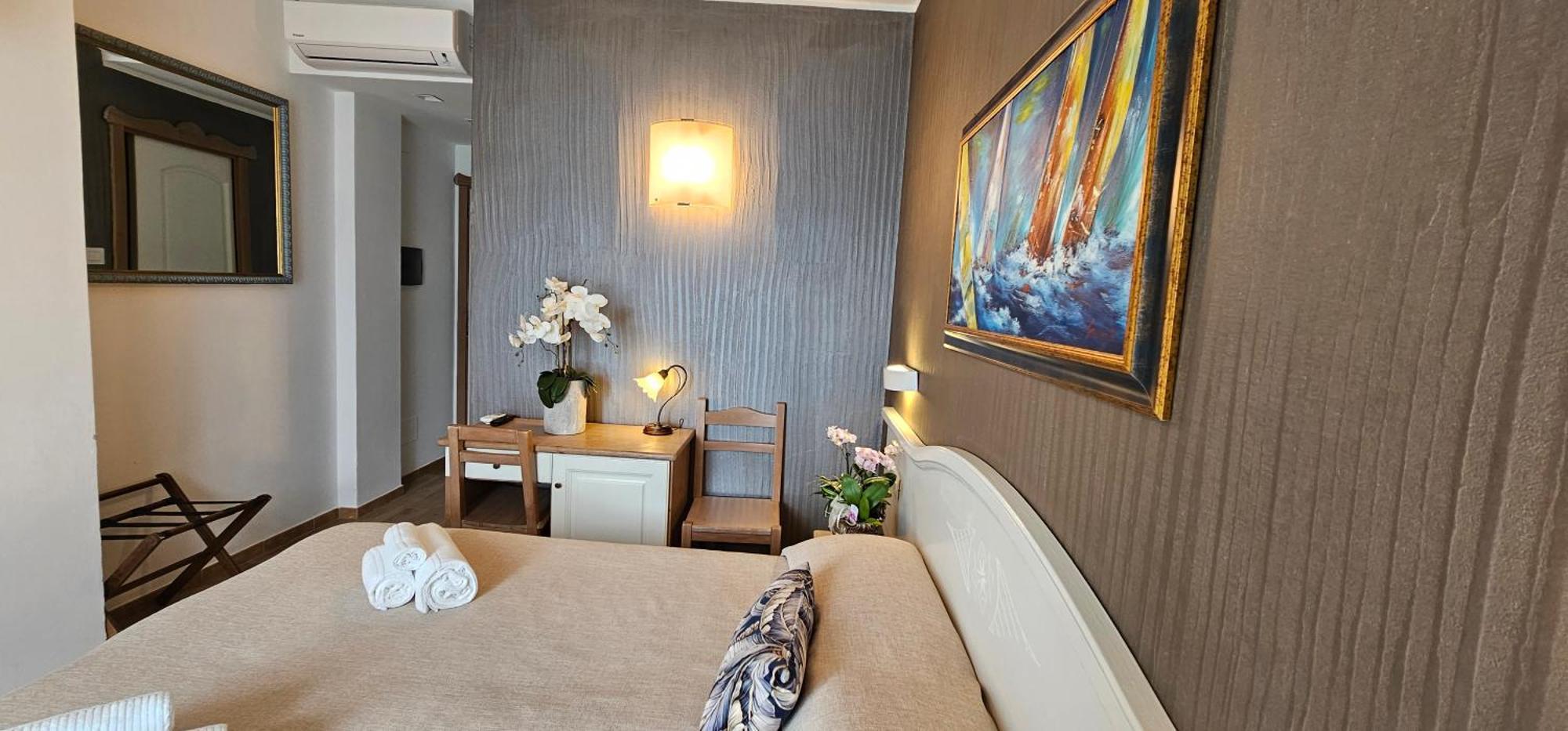 Hotel Meridiana Bellano Szoba fotó