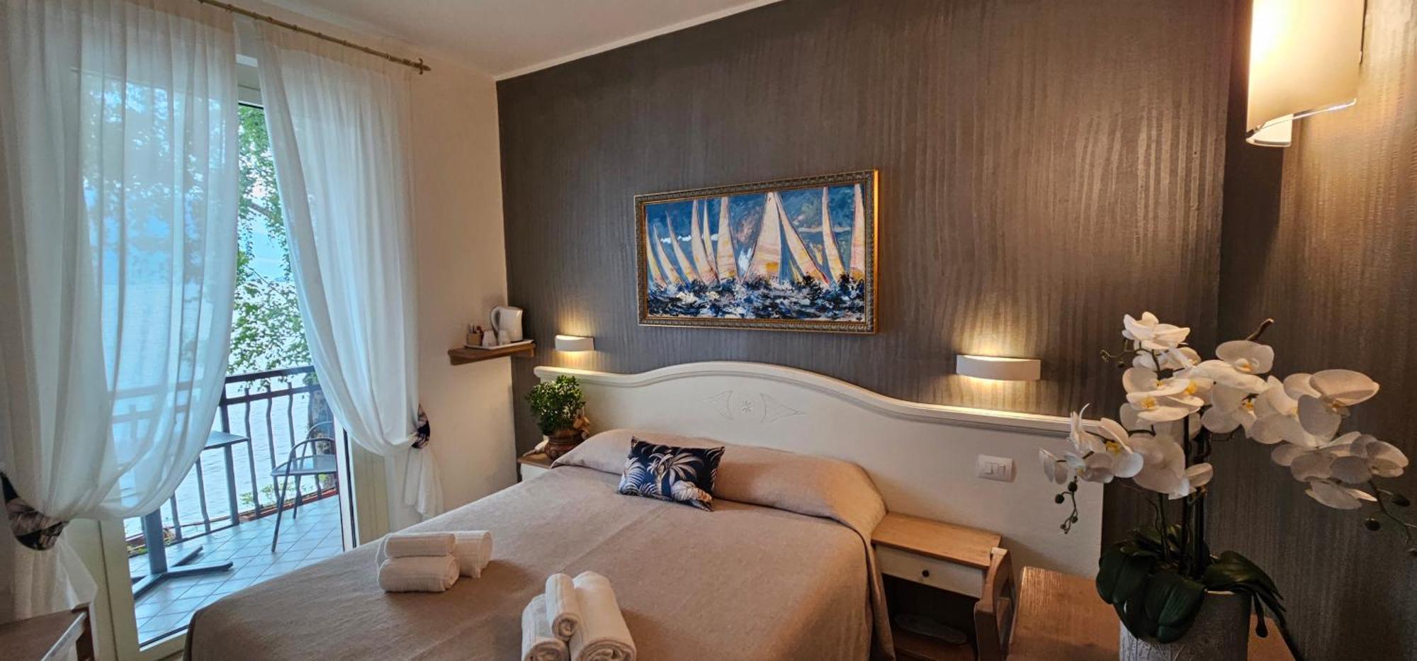 Hotel Meridiana Bellano Szoba fotó